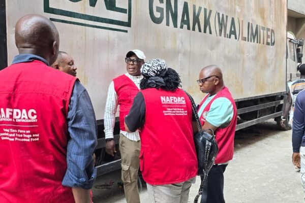 NAFDAC Seizes ₦1.5bn Banned Goods in Lagos Crackdown Raid NAFDAC officials seal off a warehouse at Lagos Trade Fair market during a major raid on banned and expired goods.