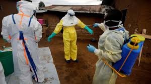 Health workers in protective suits respond to Ebola outbreak in Congo