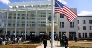 Hundreds of Nigerians queue outside the U.S. embassy in Abuja for visa interviews, many leaving disappointed after rejection.