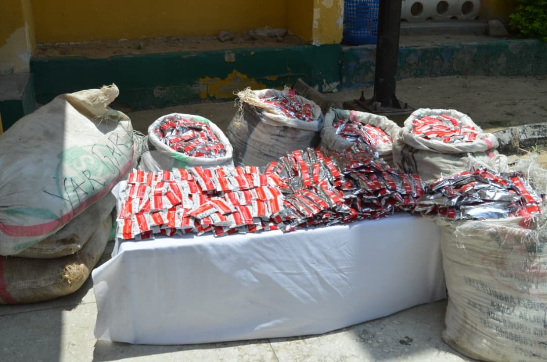 Borno police display seized therapeutic food packs meant for children