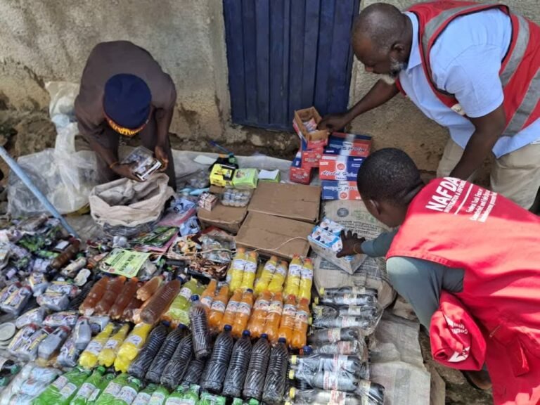 NAFDAC officials inspecting seized unregistered herbal medicines at Kaduna’s Kawo Market