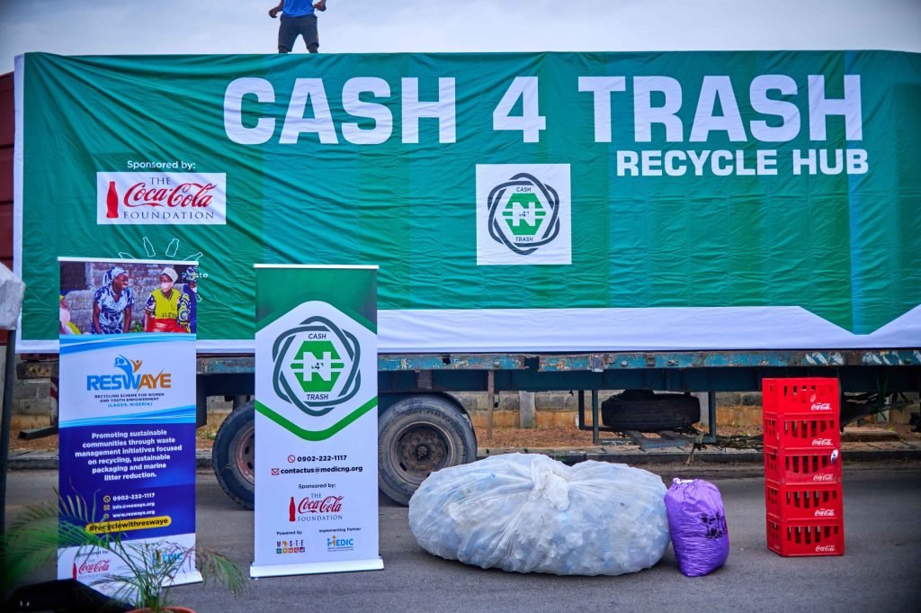 Lagos residents exchanging recyclables for cash at LAWMA collection centre