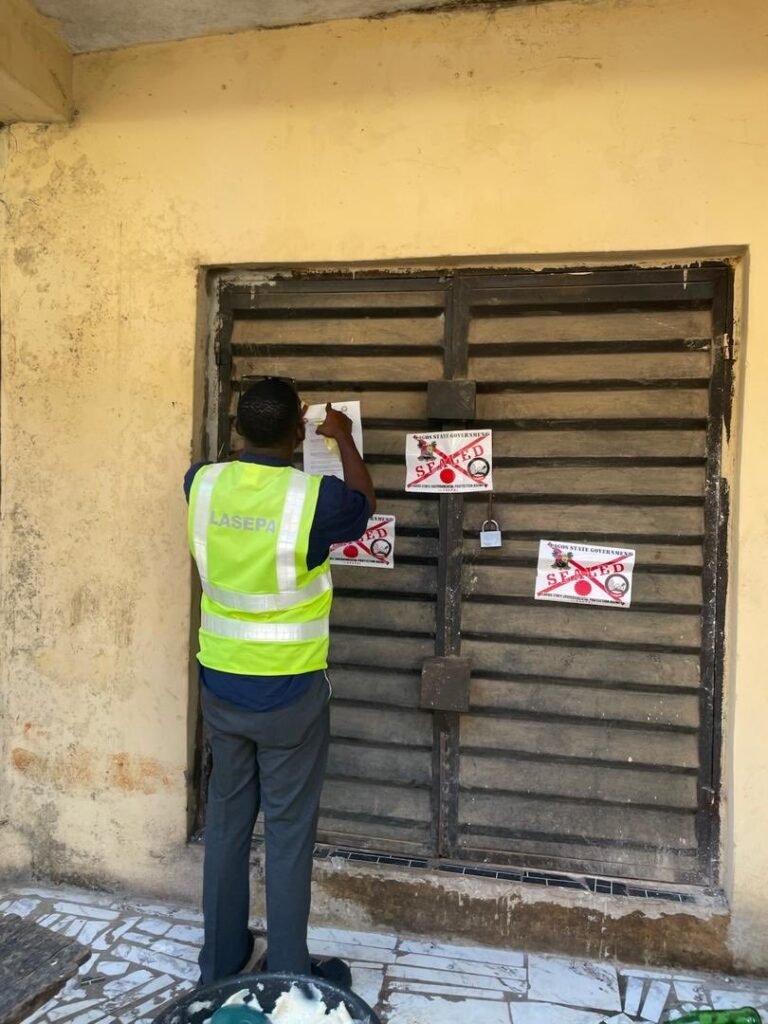 LASEPA officials seal a church and factories for noise and air pollution in Lagos.