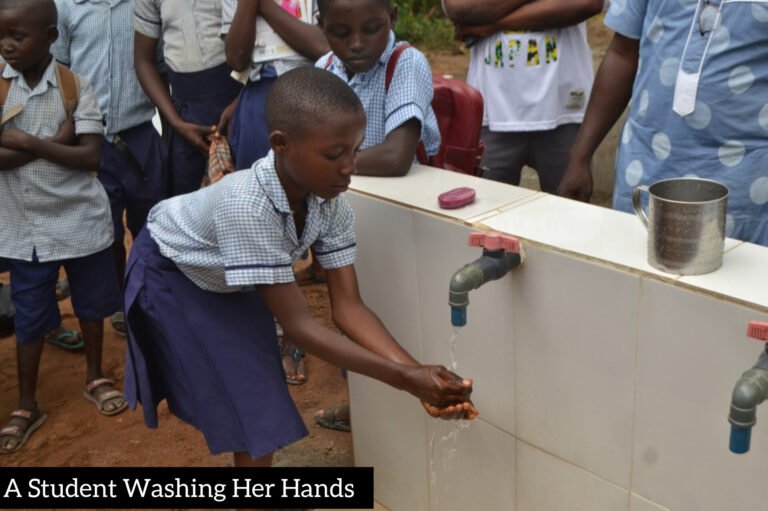 Student washing hands