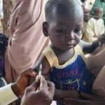 Child receives polio drops during vaccination campaign in Sokoto State