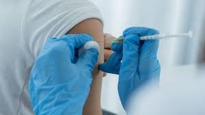 NHS healthcare worker administers cabotegravir HIV prevention injection in UK clinic
