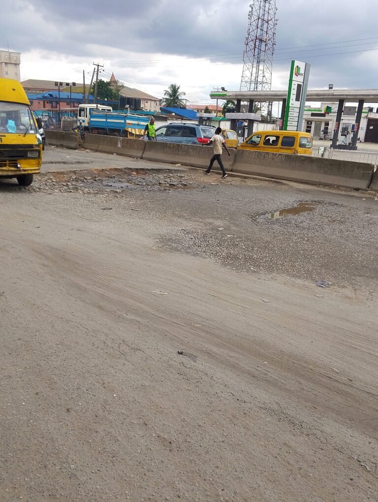 View of the Lagos-Abeokuta Expressway from Gateway, Ota, Ogun State, depicting reconstruction work and traffic flow.