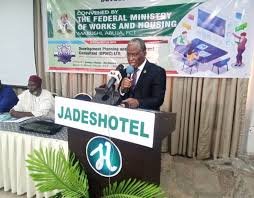 Minister addressing town planners at Abuja conference