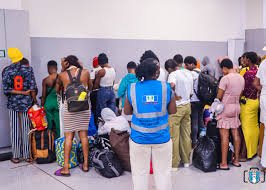 NAPTIP officials escort suspected traffickers after Abuja airport raid