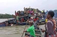 Overcrowded wooden boats docked along River Niger in Kogi State