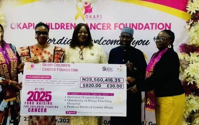 kapi Children Cancer Foundation founder Kemi Adekanye presenting donation cheques to Abuja hospitals for childhood cancer treatment