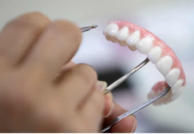 : Nigerian dentist addresses harmful oral habits during NDA conference.