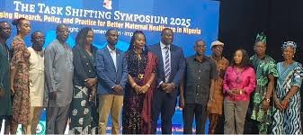 Health experts speaking at the 2025 maternal healthcare symposium in Abuja