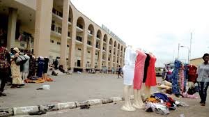 Lagos officials clearing illegally extended stalls at Tejuosho Market in Yaba.