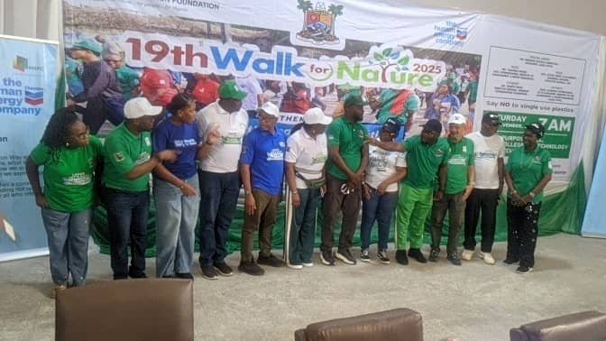 Participants marching during Walk for Nature event promoting plastic ban