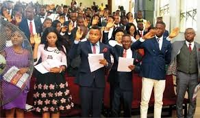 Newly inducted foreign-trained doctors receiving certificates at MDCN ceremony