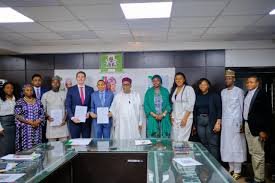 Nigerian and Brazilian officials signing pharmaceutical MoU agreement