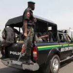 Police patrol vehicle on highway during search operation
