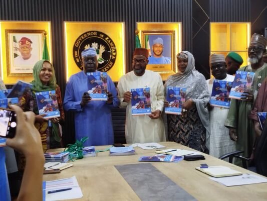 Zamfara officials and UNICEF representatives unveiling child welfare strategies in Gusau.