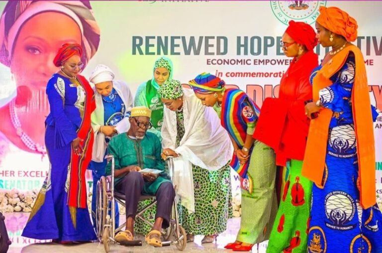 First Lady Oluremi Tinubu presenting empowerment grants to persons with disabilities