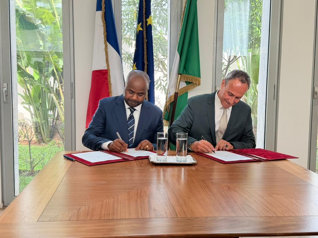 FIRS Chairman Zacch Adedeji and French DGFiP officials signing a tax innovation MoU in Abuja.