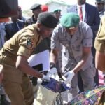 Nigeria Customs officers inspecting seized containers in Kano