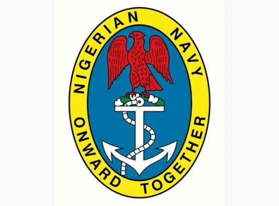 Nigerian Navy officers with seized smuggled rice in Lagos