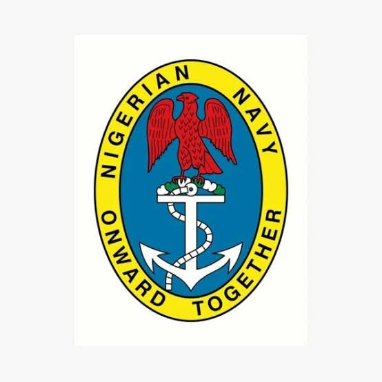 Nigerian Navy officers with seized smuggled rice in Lagos