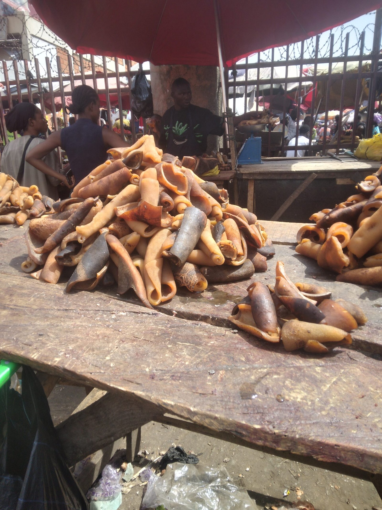 Ponmo hawker selling portions sourced from abattoir hides