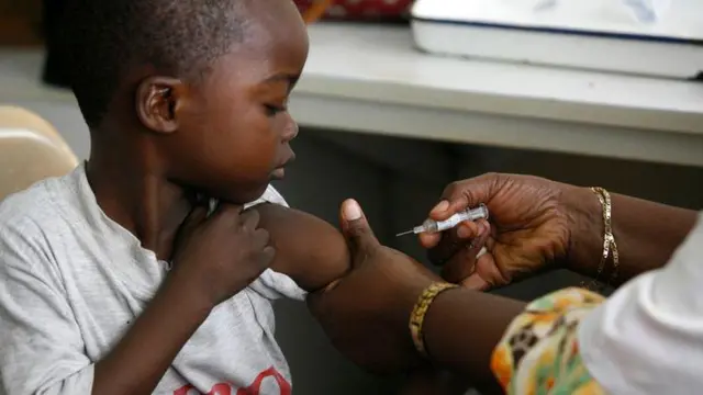 Healthcare workers administering measles and rubella vaccines to children in Ondo State