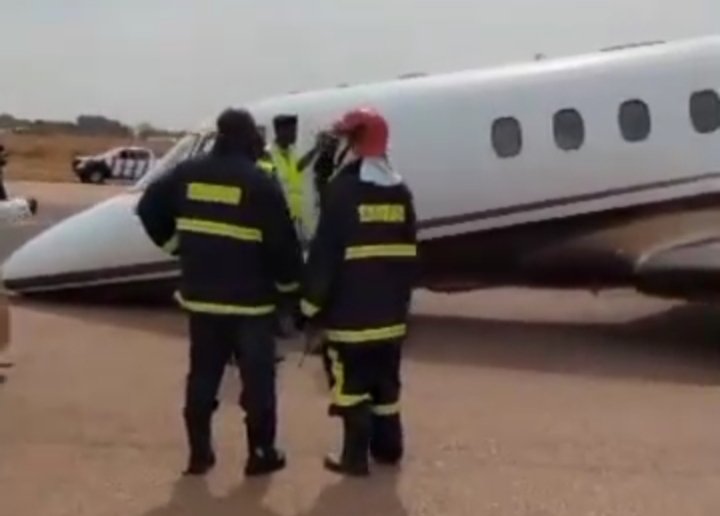 Emergency responders near a private jet at Kano airport