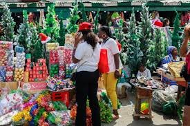 traders waiting for customers atGarki market in Abuja during charismas season