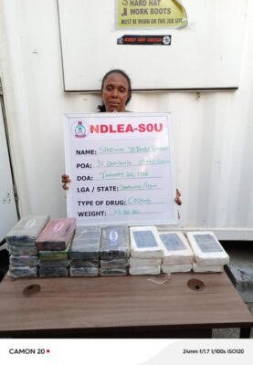 NDLEA officers displaying seized cocaine in Lagos