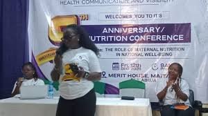 Health stakeholders discussing maternal nutrition and media advocacy in Abuja