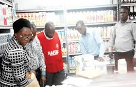 NAFDAC officials inspecting pharmaceutical products