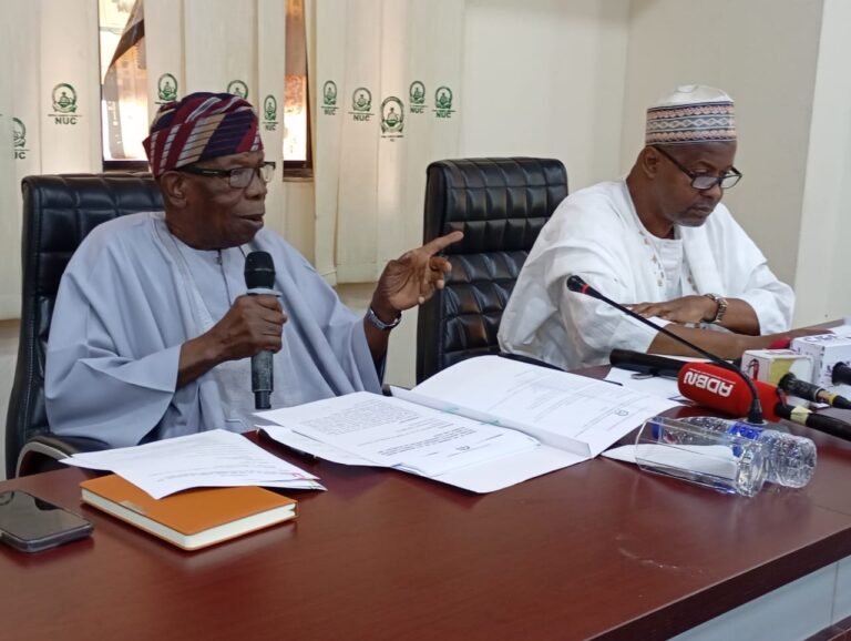 NUC leadership and newly inaugurated board members during the ICT reform announcement.