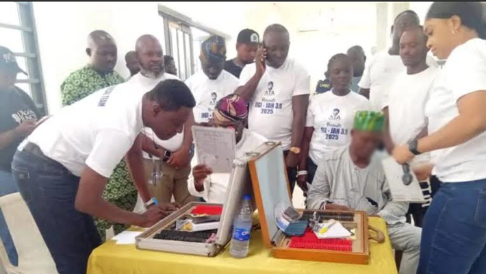Residents receiving free eye tests and glasses during JIGI-JAH outreach in Lagos