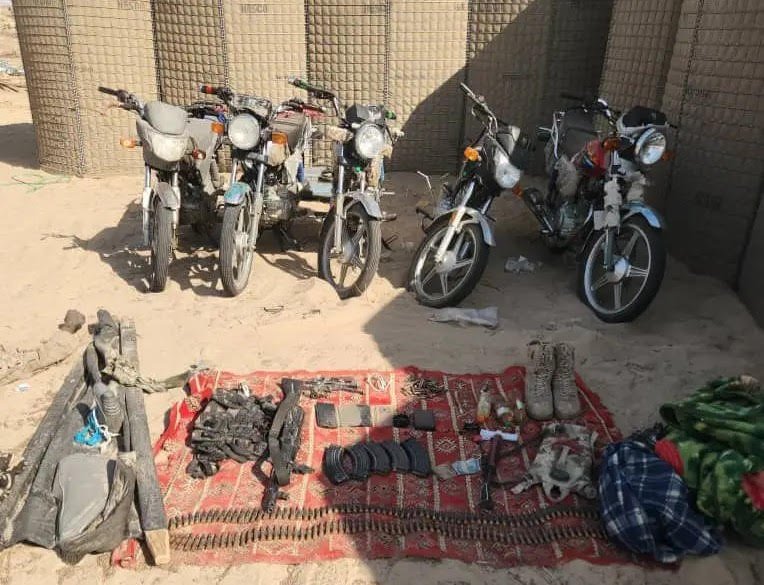 Nigerian soldiers on patrol after repelling an ISWAP attack