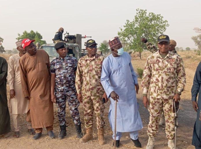 Nigerian refugees escorted by army troops into Borno State