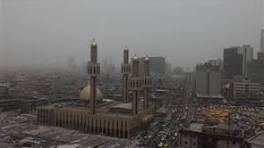 Harmattan dust haze over Abuja skyline