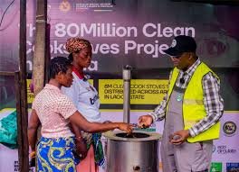 Lagos clean cookstove with emissions reduction campaign banner
