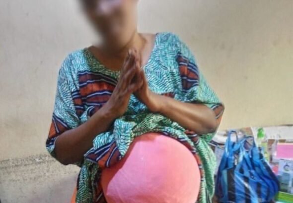 NDLEA officers displaying seized drugs after major interception