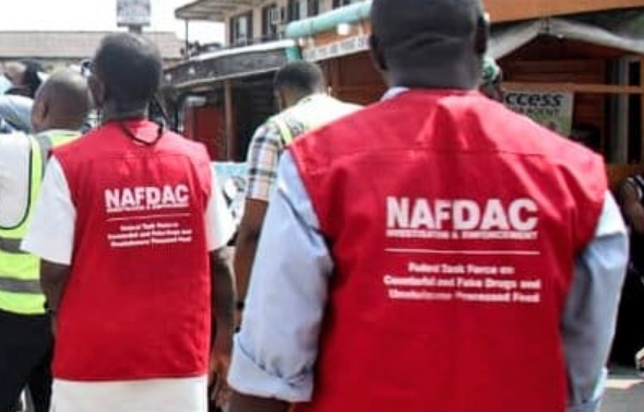 NAFDAC officials displaying seized counterfeit drugs in Lagos