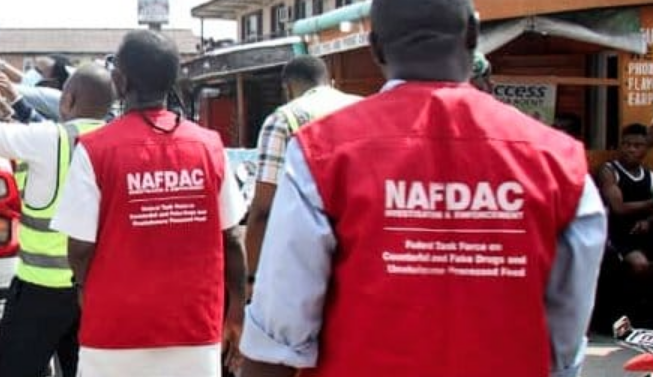 NAFDAC officials displaying seized counterfeit drugs in Lagos