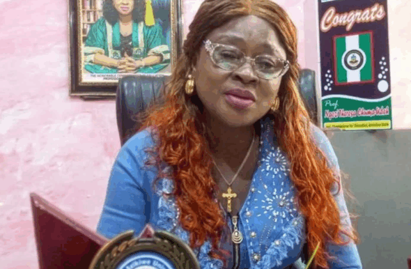 Anambra education commissioner addressing child abuse suspect in Awka