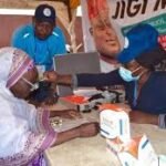 Beneficiaries receiving free reading glasses under Jigi Bola initiative