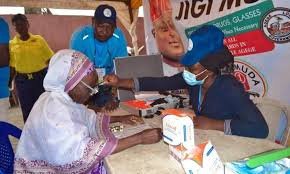 Beneficiaries receiving free reading glasses under Jigi Bola initiative