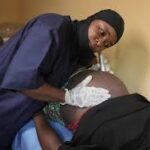 Health workers support pregnant women in conflict-affected areas