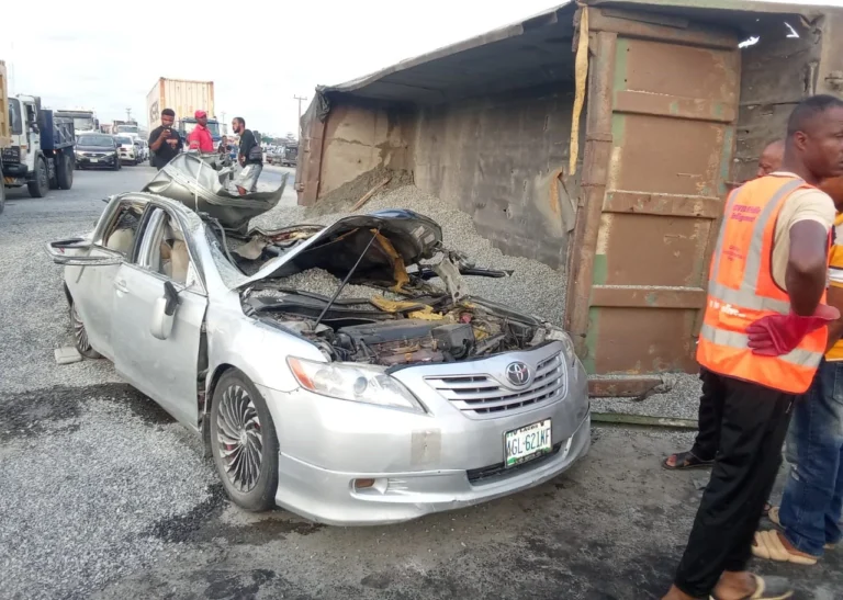 Overturned granite truck crushing a car on Lekki–Ajah Expressway