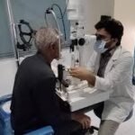 Patient undergoing cataract eye examination in hospital